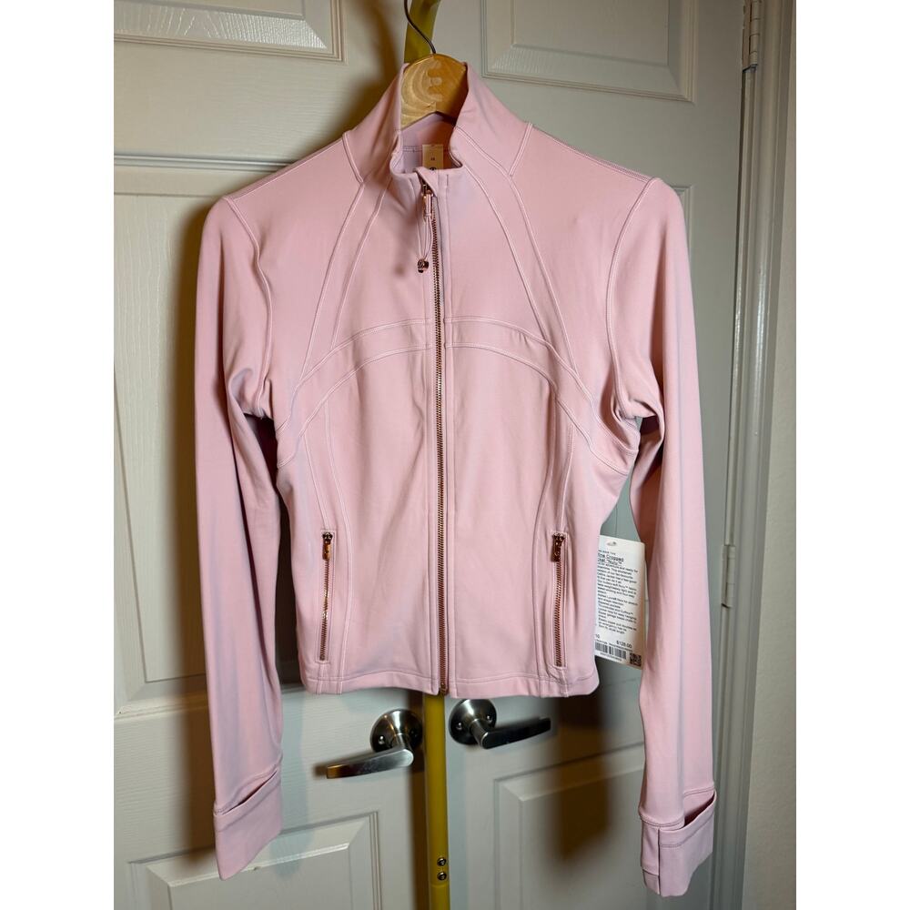 lululemon Define Cropped Jacket in the color Pink Haze with rose gold hardware.